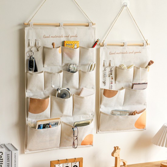 Multifunctional cotton and linen dormitory bedside storage bag, bedroom, and living room door storage bag. Multifunctional cotton and linen dormitory bedside storage bag, bedroom, and living room door storage bag.