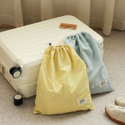 Drawstring waterproof nylon travel bag, portable multi-functional clothing and shoe divider, business trip luggage storage bag