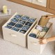 Wardrobe hanging bag, perfect for organizing pants and clothing. Layered fabric storage bag with large capacity. Wardrobe hanging bag, perfect for organizing pants and clothing. Layered fabric storage bag with large capacity.